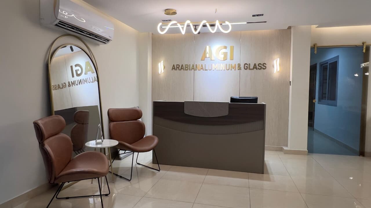 AGI reception — front desk and lounge seating